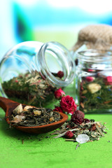 Assortment of herbs and tea in glass jars