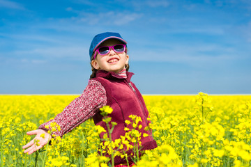 girl in yellow field of rape