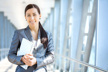 sexy businesswoman on the blue modern background