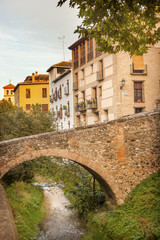 Fototapeta na wymiar Old Bridge Walking Street River Rio Darro Albaicin Granada