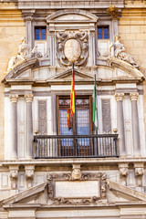 Fototapeta premium Ornate Spanish Government Building Window Crest Flags Granada