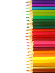 Colored pencils isolated on white background
