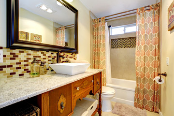 Bathroom with antique cabinets