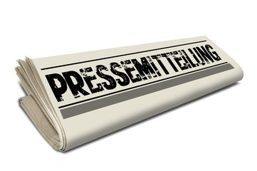 Zeitungsrolle mit Pressemitteilung