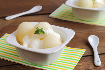 Melon balls with mint-flavored yogurt