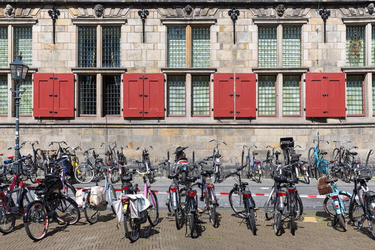 Bicycles in front of an old Dutch historic building