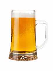 A pint of sparkling beer isolated on white background