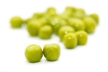 green peas on a white background. macro