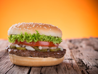 Delicious hamburger on wood