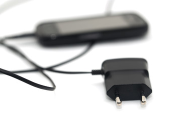 phone with an adapter on a white background
