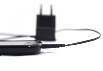 phone with an adapter on a white background