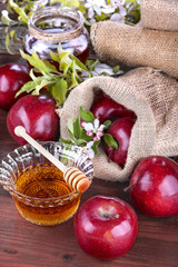 apples in a linen bag with honey and apple flower