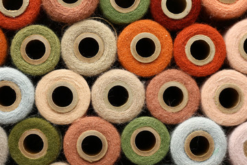 Abstract Background Collection of Antique Yarn Spools