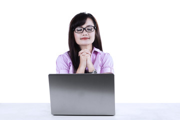 Businesswoman praying isolated