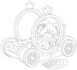 Little girl sleeps in her bed - carriage of a princess