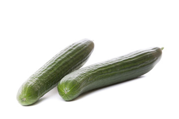 Fresh snake cucumber isolated on white background