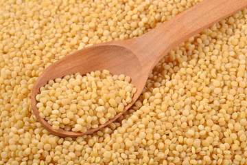 Gordijnen Couscous in a spoon © sss615