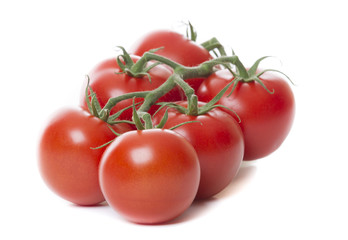 Fresh tomatoes isolated on white background
