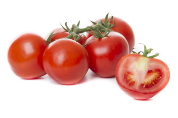 Fresh tomatoes isolated on white background
