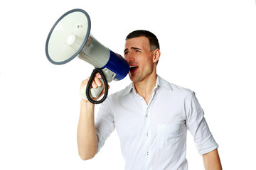 Portrait of a man roaring loudly into megaphone 