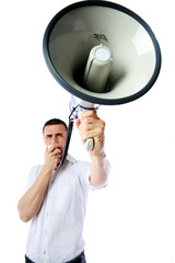Portrait of a man roaring loudly into megaphone