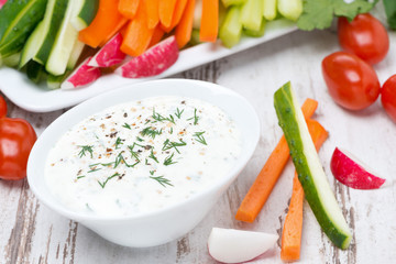 yoghurt sauce with mustard and fresh vegetables, top view
