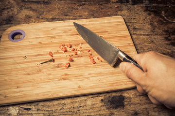 Hand chopping chili
