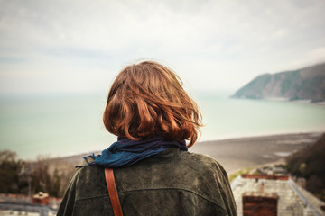 Young woman admiring the seaside view