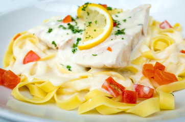 close-up of plate of pasta and smoked salmon