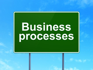 Finance concept: Business Processes on road sign background