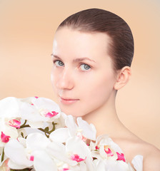 Fototapeta premium Lovely cute girl with flowers