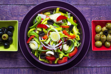 Fresh colorful vegetable salad platter wooden table