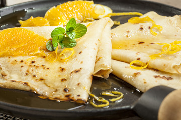 crepes with orange and mint