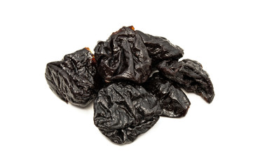 Prunes on a white background