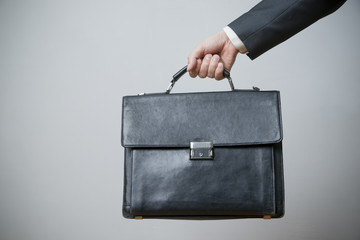 Businessman with briefcase in hand