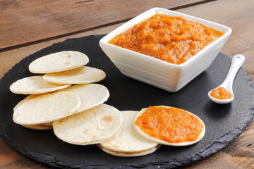 Roasted vegetable sauce with pita bread. Ajvar