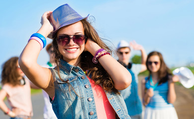 stylish young woman in sunglasses