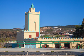 Modern yellow mosque building. Tangier town, Morocco