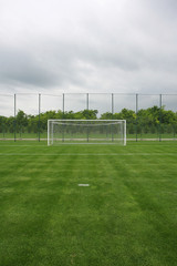 Obraz premium Goal at the stadium Soccer field with white lines