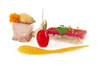 fried pork belly with raw tuna and cabbage salad