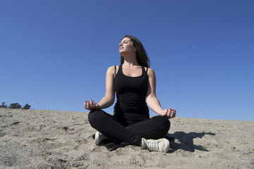 Naklejka na ściany i meble Woman - yoga - beach - meditation - healthy lifestyle & wellness