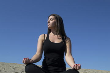 Fototapeta na wymiar Woman - sand - beach - meditation - healthy lifestyle