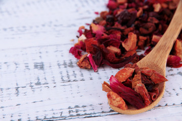 Aromatic dry tea on wooden background