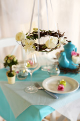 Fototapeta premium Beautiful holiday Easter table setting in blue tones,