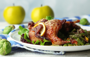 Roasted quails with vegetables