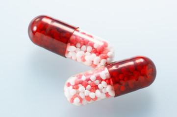 Closeup of red capsule medicines.
