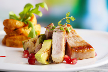 Grilled meat  with fried potato and marrow pieces and