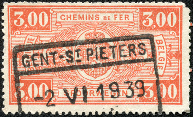 stamp printed in Belgium shows Belgian coat of arms