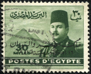 stamp printed by Egypt, shows King Farouk and Pyramids