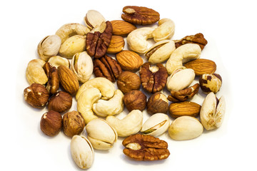 Heap of assorted nuts .